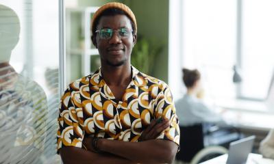 Portrait of a young, black entrepreneur in his office