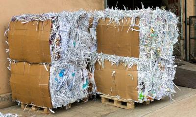 Shredded paper on pallets ready for waste collection